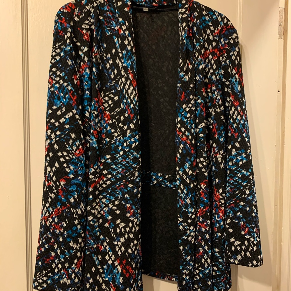 Black abstract jacket. Red, white and blue
